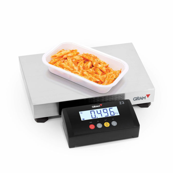 Industrial scale suitable to weigh trays of food and later print labels with product weighing information